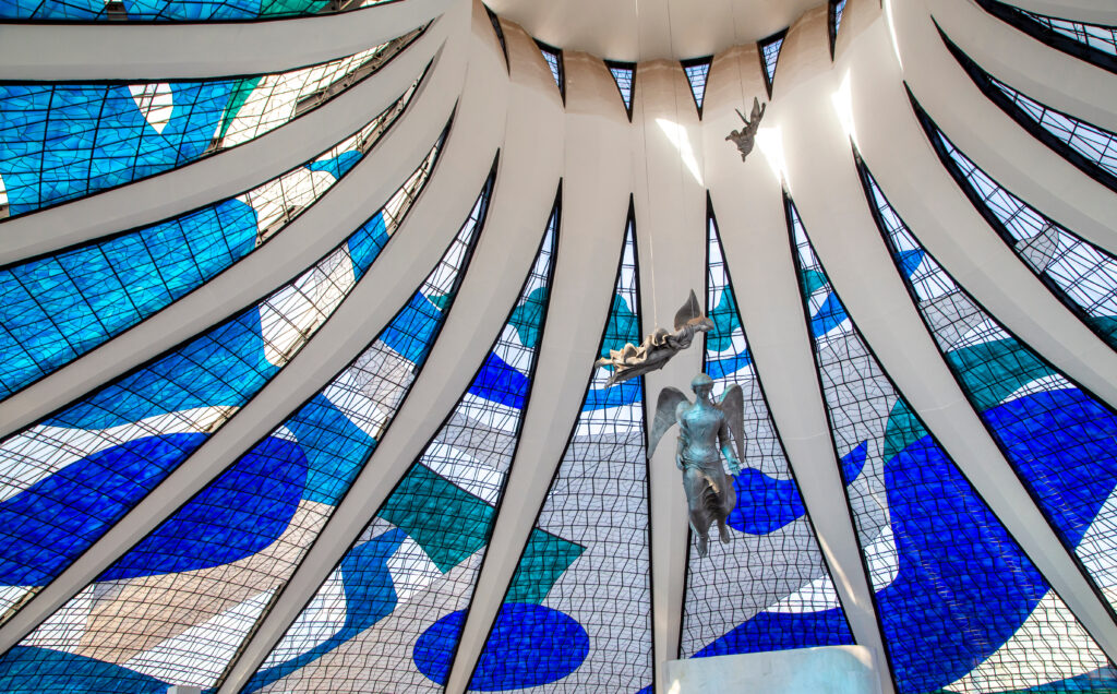 Brasilia, Distrito Federal, Brazil (2016): Stained glass and angels inside the Cathedral of Brasilia, at Federal District, Brazil. Architecture design by Oscar Niemeyer.